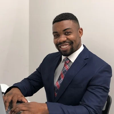 Chiropractor Laurel MD Takura A. Tela